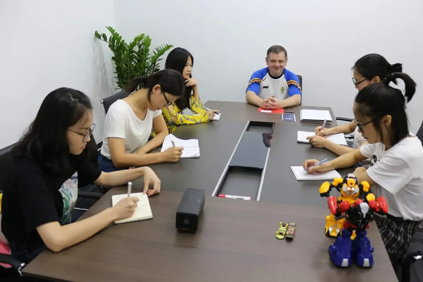 Ériu sourcing team meeting a supplier in Shenzhen, factory-direct POS hardware and barcode scanner sourcing for Ireland
