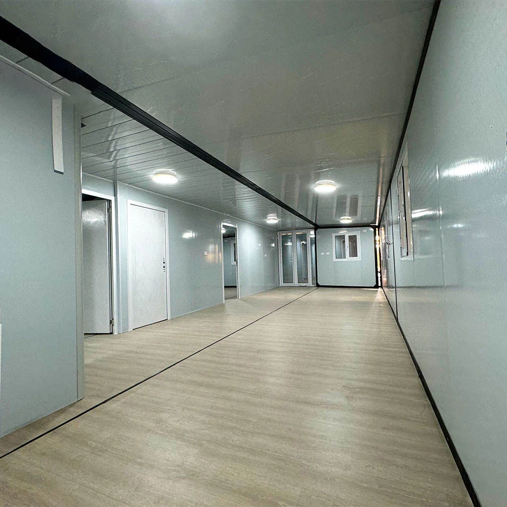 40ft expandable container home interior corridor — full depth of unit showing multiple rooms and light wood flooring