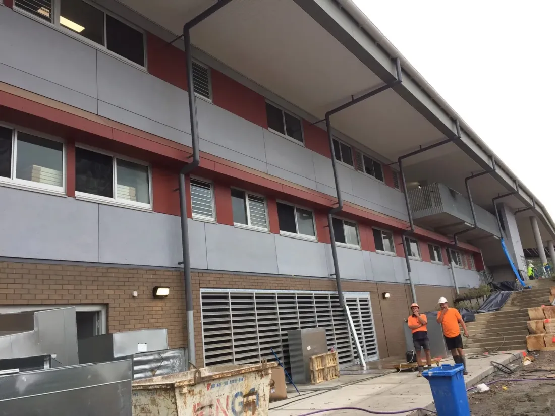 Cladding and façade materials installed on a commercial building in Sydney, sourced through Ériu