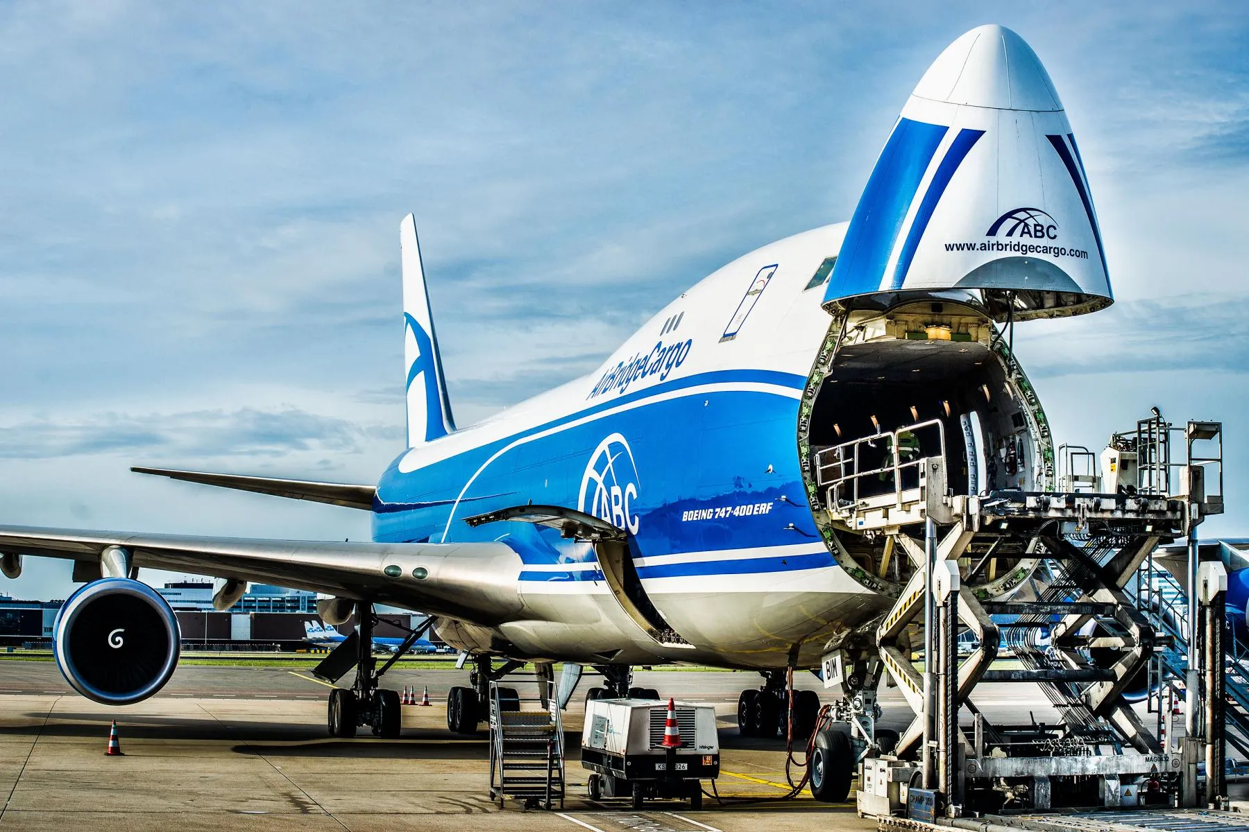 Freighter aircraft and cargo handling on the apron at Zhengzhou Xinzheng International Airport (CGO), central China's Tier-1 air-cargo hub